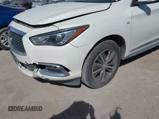 2016 Infiniti QX60 with VIN 5N1AL0MM6GC520846, listed as a IAAI auction lot 41795826 with 81,190 mi miles and . Bid and sale history available at DreamBid. Image 18.