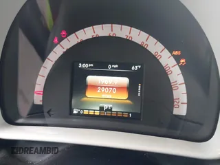 2016 Smart fortwo Passion z VIN WMEFJ5DA3GK055906, wystawiony jako IAAI lot #42274280 z przebiegiem 29 070 mil mil oraz . Historia ofert i sprzedaży dostępna na DreamBid. Obrazek 7.