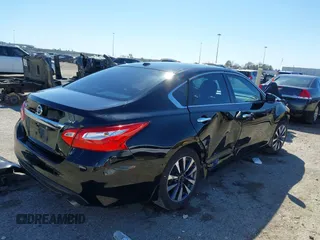 2016 Nissan Altima SV with VIN 1N4AL3AP1GC283029, listed as a IAAI auction lot 41715088 with 165,223 mi miles and . Bid and sale history available at DreamBid. Image 4.