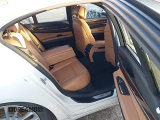 2013 BMW 7 Series 740i with VIN WBAYA6C54DD143796, listed as a IAAI auction lot 41433835 with 1 mi miles. Bid and sale history available at carsss.com. Image 8.