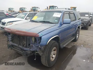 1999 Toyota 4Runner SR5 with VIN JT3GN86R1X0097244, listed as a IAAI auction lot 41948315 with 128,531 mi miles and . Bid and sale history available at DreamBid. Image 2.