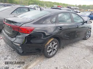 2021 Kia Forte LXS with VIN 3KPF24ADXME410282, listed as a IAAI auction lot 42004328 with 62,817 mi miles. Bid and sale history available at carsss.com. Image 4.