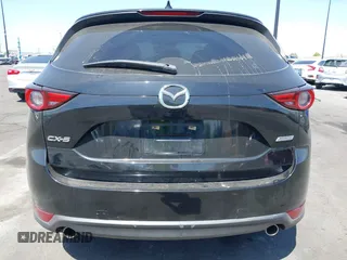 2018 Mazda CX-5 Grand Touring z VIN JM3KFADM7J0327272, wystawiony jako IAAI lot #42279536 z przebiegiem 97 478 mil mil oraz . Historia ofert i sprzedaży dostępna na DreamBid. Obrazek 16.