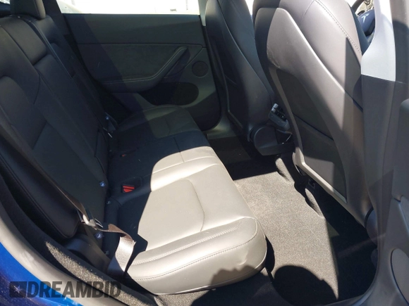 2024 Tesla Model Y Long Range with VIN 7SAYGDEE5RA329172, listed as a IAAI auction lot 41892147 with 8,030 mi miles and . Bid and sale history available at DreamBid. Image 8.
