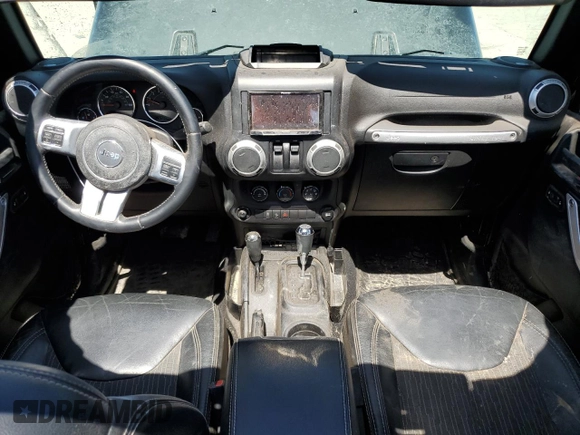 2015 Jeep Wrangler Sport with VIN 1C4GJWAG8FL563198, listed as a Copart auction lot 52867385 with 47,854 mi miles and Salvage title. Bid and sale history available at DreamBid. Image 8.
