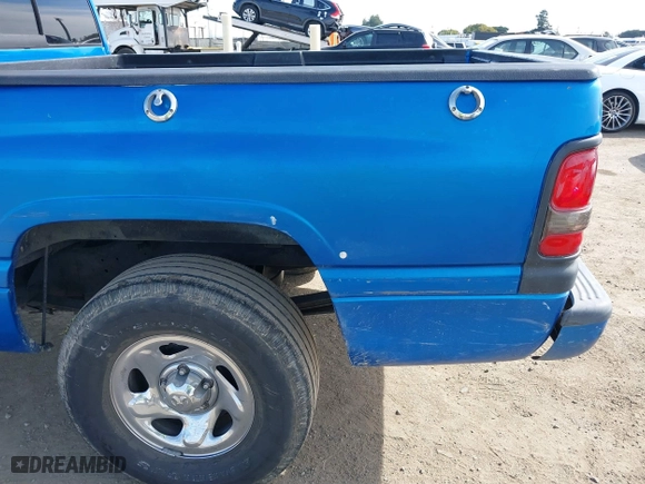 1999 Dodge Ram 1500 with VIN 3B7HC13Z2XG197088, listed as a IAAI auction lot 41686269 with 210,662 mi miles. Bid and sale history available at carsss.com. Image 18.