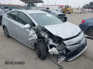 2015 Toyota Prius Four with VIN JTDKN3DU1F0445607, listed as a IAAI auction lot 42449370 with 215,697 mi miles and . Bid and sale history available at DreamBid. Image 1.