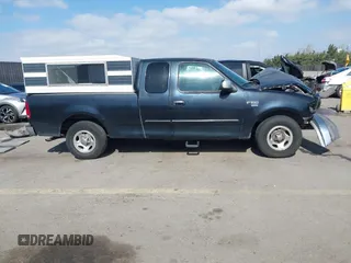 2002 Ford F-150 XL with VIN 1FTRX17L02NB79722, listed as a IAAI auction lot 41538404 with 202,050 mi miles. Bid and sale history available at carsss.com. Image 14.