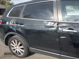 2010 Mazda CX-9 Sport with VIN JM3TB2MV0A0200295, listed as a IAAI auction lot 41233604 with 179,554 mi miles. Bid and sale history available at carsss.com. Image 15.