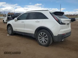 2022 Cadillac XT4 FWD Sport z VIN 1GYFZER47NF165920, wystawiony jako Copart lot #50389935 z przebiegiem 57 410 mil mil oraz Szkoda całkowita • Salvage title. Historia ofert i sprzedaży dostępna na DreamBid. Obrazek 2.