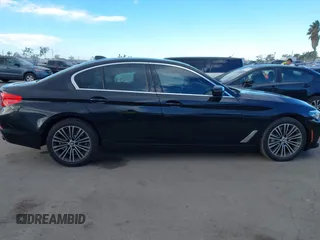 2019 BMW 5 Series 530i with VIN WBAJA5C54KWW45379, listed as a IAAI auction lot 41276092 with 77,025 mi miles. Bid and sale history available at carsss.com. Image 13.