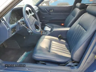 1982 Datsun 280ZX z VIN JN1HZ04S5CX457910, wystawiony jako Copart lot #77132604 z przebiegiem 261 383 mil mil oraz Szkody całkowita. Historia ofert i sprzedaży dostępna na DreamBid. Obrazek 7.
