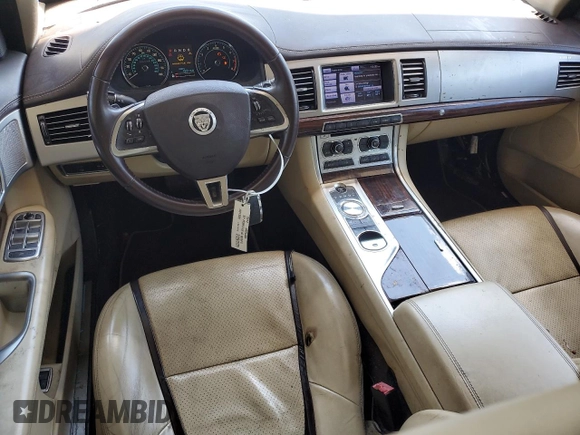 2012 Jaguar XF Portfolio with VIN SAJWA0HB9CLS50662, listed as a Copart auction lot 54734555 with 90,073 mi miles and Clean Title. Bid and sale history available at carsss.com. Image 8.