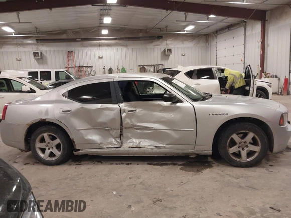 2009 Dodge Charger SE with VIN 2B3KA43V19H609614, listed as a IAAI auction lot 41515678 with 195,787 mi miles. Bid and sale history available at carsss.com. Image 13.
