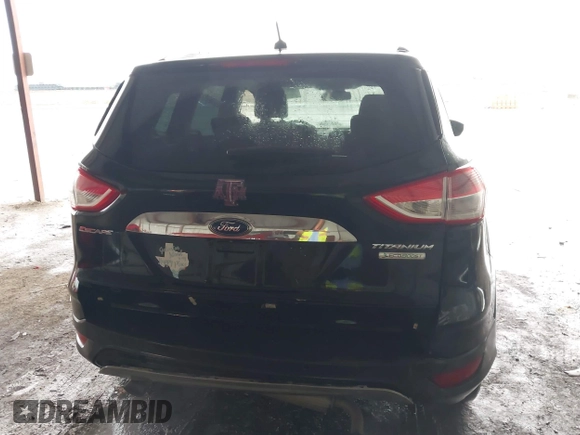 2014 Ford Escape Titanium z VIN 1FMCU0J96EUA84108, wystawiony jako IAAI lot #42114002 z przebiegiem 176 735 mil mil oraz . Historia ofert i sprzedaży dostępna na DreamBid. Obrazek 6.