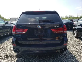 2017 BMW X5 xDrive35i with VIN 5UXKR0C37H0X80867, listed as a Copart auction lot 58697515 with 54,191 mi miles and Salvage title. Bid and sale history available at DreamBid. Image 6.