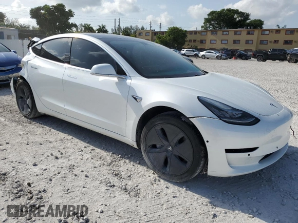 2020 Tesla Model 3 Standard Range Plus z VIN 5YJ3E1EA3LF632566, wystawiony jako Copart lot #56416625 z przebiegiem Nie podano mil oraz Nie do naprawy • Non repairable. Historia ofert i sprzedaży dostępna na DreamBid. Obrazek 4.