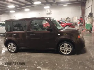 2009 Nissan Cube S z VIN JN8AZ28R39T124465, wystawiony jako IAAI lot #40769739 z przebiegiem 145 993 mil mil oraz . Historia ofert i sprzedaży dostępna na DreamBid. Obrazek 13.