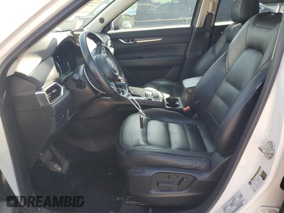 2019 Mazda CX-5 Grand Touring with VIN JM3KFBDM2K1663140, listed as a Copart auction lot 61713755 with 68,101 mi miles and Salvage title. Bid and sale history available at DreamBid. Image 7.