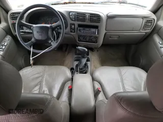 2001 GMC Jimmy SLT with VIN 1GKDT13W712155718, listed as a Copart auction lot 80688554 with 114,116 mi miles and Salvage Title. Bid and sale history available at carsss.com. Image 8.