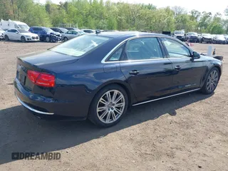 2014 Audi A8 3.0T z VIN WAURGAFD7EN005979, wystawiony jako IAAI lot #42169900 z przebiegiem 126 523 mil mil oraz . Historia ofert i sprzedaży dostępna na DreamBid. Obrazek 4.