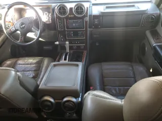 2004 Hummer H2 with VIN 5GRGN23U64H121213, listed as a Copart auction lot 42001135 with 0 mi miles and Salvage Title. Bid and sale history available at carsss.com. Image 8.