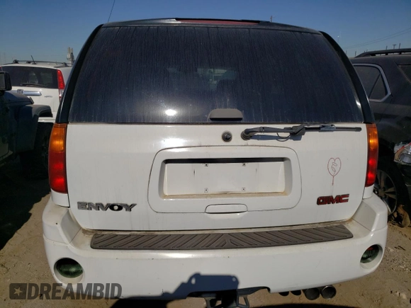 2002 GMC Envoy SLT with VIN 1GKDS13SX22184163, listed as a Copart auction lot 86400894 with 0 mi miles and Salvage Title. Bid and sale history available at carsss.com. Image 6.