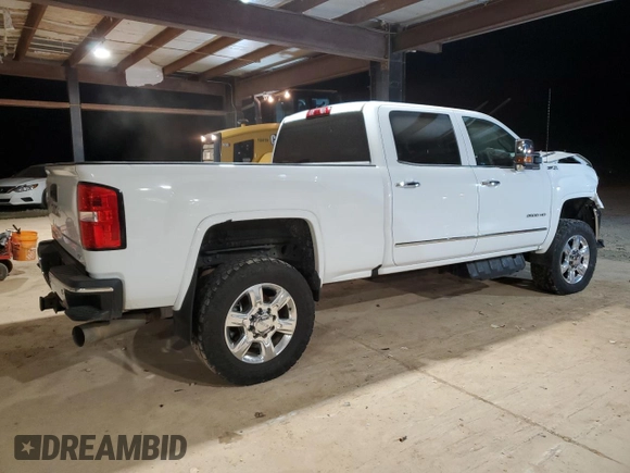 2018 GMC Sierra 2500HD SLT with VIN 1GT12TEY7JF279153, listed as a Copart auction lot 87697105 with 121,082 mi miles and Salvage Title. Bid and sale history available at carsss.com. Image 3.