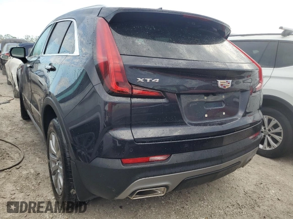 2022 Cadillac XT4 FWD Premium Luxury z VIN 1GYFZCR44NF166169, wystawiony jako Copart lot #77981414 z przebiegiem 9 734 mil mil oraz Nie do naprawy • Non repairable. Historia ofert i sprzedaży dostępna na DreamBid. Obrazek 6.