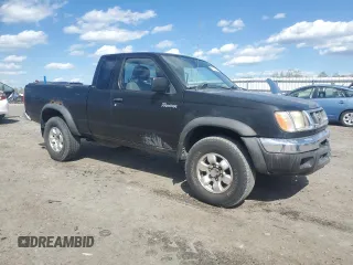1999 Nissan Frontier XE z VIN 1N6ED26Y2XC301913, wystawiony jako Copart lot #53152165 z przebiegiem 271 272 mil mil oraz Szkoda całkowita • Salvage title. Historia ofert i sprzedaży dostępna na DreamBid. Obrazek 4.