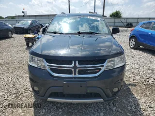 2013 Dodge Journey SXT with VIN 3C4PDDBG0DT532765, listed as a Copart auction lot 61481335 with 193,066 mi miles and Salvage title. Bid and sale history available at DreamBid. Image 5.