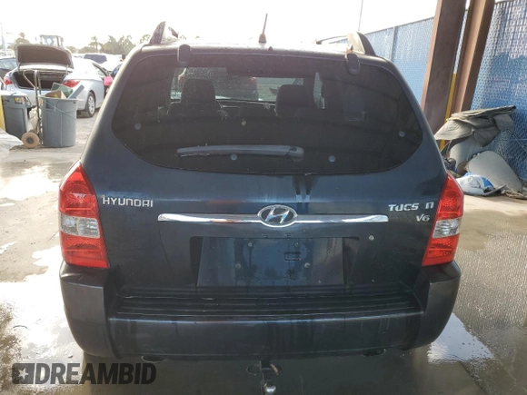 2005 Hyundai Tucson GLS with VIN KM8JN12D85U062222, listed as a Copart auction lot 77317334 with 192,758 mi miles and Salvage Title. Bid and sale history available at carsss.com. Image 6.