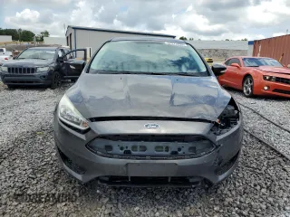 2015 Ford Focus Titanium z VIN 1FADP3N28FL239706, wystawiony jako Copart lot #62478895 z przebiegiem 143 536 mil mil oraz Szkoda całkowita • Salvage title. Historia ofert i sprzedaży dostępna na DreamBid. Obrazek 5.