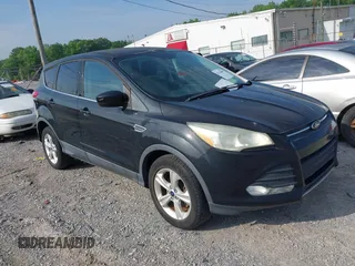 2013 Ford Escape SE with VIN 1FMCU0GX9DUD64514, listed as a IAAI auction lot 42120601 with 193,415 mi miles and . Bid and sale history available at carsss.com. Image 1.