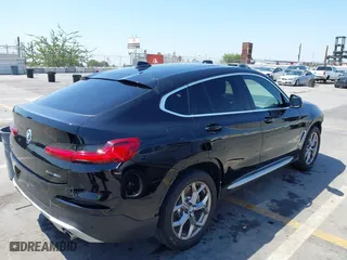 2020 BMW X4 xDrive30i with VIN 5UX2V1C06L9B62406, listed as a IAAI auction lot 40178700 with 48,947 mi miles. Bid and sale history available at carsss.com. Image 4.