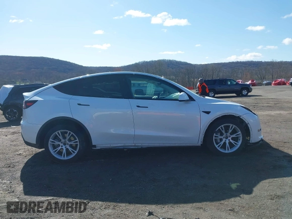 2021 Tesla Model Y Long Range with VIN 5YJYGDEE9MF239726, listed as a IAAI auction lot 41952158 with 37,088 mi miles and . Bid and sale history available at DreamBid. Image 14.