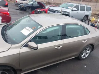 2015 Volkswagen Passat 1.8T Limited Edition with VIN 1VWAS7A30FC089976, listed as a IAAI auction lot 41188354 with 87,950 mi miles. Bid and sale history available at carsss.com. Image 14.
