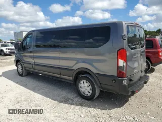 2015 Ford Transit Passenger XL with VIN 1FBZX2YGXFKA48977, listed as a Copart auction lot 77980594 with 112,364 mi miles and Clean Title. Bid and sale history available at carsss.com. Image 2.