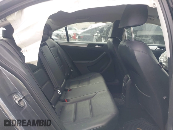 2014 Volkswagen Jetta SE z VIN 3VWD17AJ9EM298175, wystawiony jako IAAI lot #42084756 z przebiegiem 93 039 mil mil oraz . Historia ofert i sprzedaży dostępna na DreamBid. Obrazek 8.