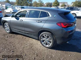 2022 BMW X2 xDrive28i with VIN WBXYJ1C05N5U40472, listed as a IAAI auction lot 41433452 with 67,801 mi miles. Bid and sale history available at carsss.com. Image 3.