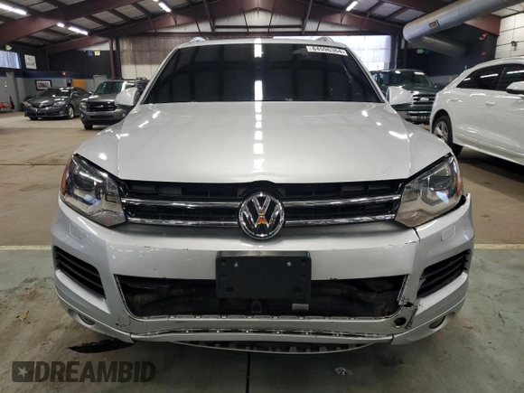2012 Volkswagen Touareg Exec with VIN WVGEF9BP9CD009937, listed as a Copart auction lot 84596364 with 97,431 mi miles and Clean Title. Bid and sale history available at DreamBid. Image 5.