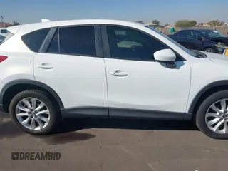 2014 Mazda CX-5 Grand Touring with VIN JM3KE4DY4E0375809, listed as a IAAI auction lot 41468078 with 151,226 mi miles. Bid and sale history available at carsss.com. Image 13.