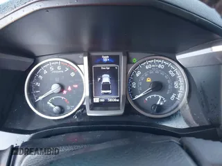 2021 Toyota Tacoma SR5 with VIN 5TFAZ5CN7MX101810, listed as a IAAI auction lot 42454418 with 58,930 mi miles and . Bid and sale history available at DreamBid. Image 7.