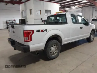 2015 Ford F-150 XLT with VIN 1FTEX1EP6FKE21697, listed as a IAAI auction lot 41960136 with 199,653 mi miles. Bid and sale history available at carsss.com. Image 4.