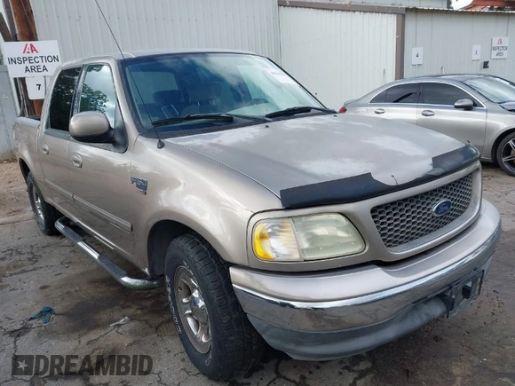 2003 Ford F-150 XLT with VIN 1FTRW07623KD34295, listed as a IAAI auction lot 41515387 with 163,506 mi miles. Bid and sale history available at carsss.com. Image 1.