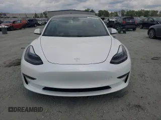 2021 Tesla Model 3 Standard Range Plus z VIN 5YJ3E1EAXMF973450, wystawiony jako Copart lot #52766645 z przebiegiem 66 827 mil mil oraz Szkoda całkowita • Salvage title. Historia ofert i sprzedaży dostępna na DreamBid. Obrazek 5.