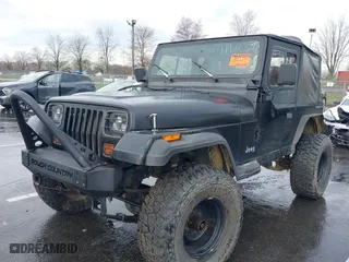 1995 Jeep Wrangler S with VIN 1J4FY19P0SP258399, listed as a IAAI auction lot 41970320 with 151,621 mi miles. Bid and sale history available at carsss.com. Image 2.