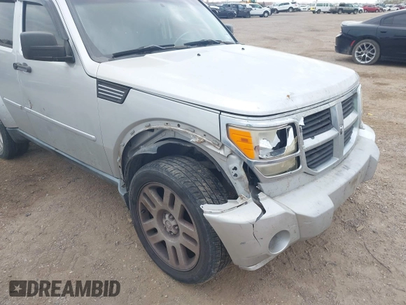 2010 Dodge Nitro SE with VIN 1D4PT2GK8AW144406, listed as a IAAI auction lot 41590691 with 165,959 mi miles and . Bid and sale history available at DreamBid. Image 6.