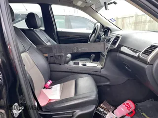 2012 Jeep Grand Cherokee Laredo with VIN 1C4RJEAG8CC119401, listed as a IAAI auction lot 41724335 with 233,265 mi miles. Bid and sale history available at carsss.com. Image 5.