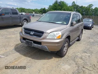 2004 Honda Pilot EX with VIN 2HKYF18434H575250, listed as a IAAI auction lot 42219882 with 196,515 mi miles and . Bid and sale history available at carsss.com. Image 2.